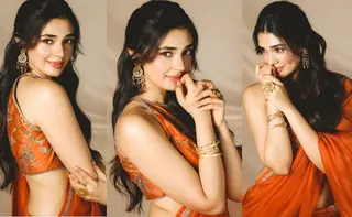 HOT: Kalyan Ram's Heroine Stuns In Orange Saree